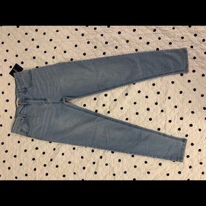 Brand new jean tags still attached